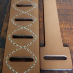 Attache d'une sangle de guitare